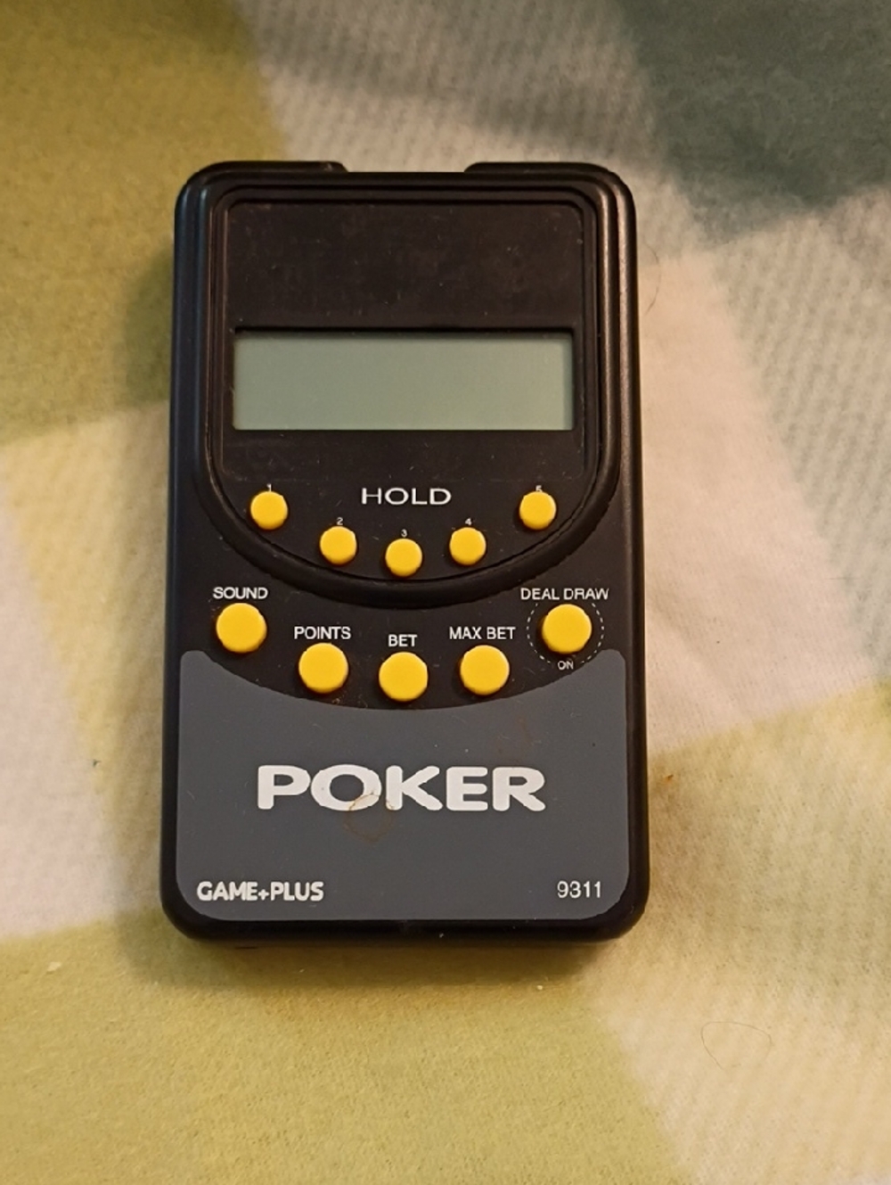 Game-Plus Poker Handheld Electronic Game in Black and Gray with Yellow Buttons